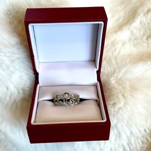 1/10 ct. tw. diamond swirl ring in 10k white gold
